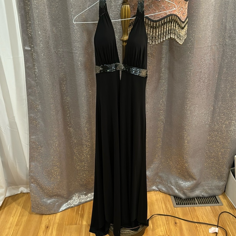 Black elegance BCBG maxazria size XS , high & low dress with a tie back.